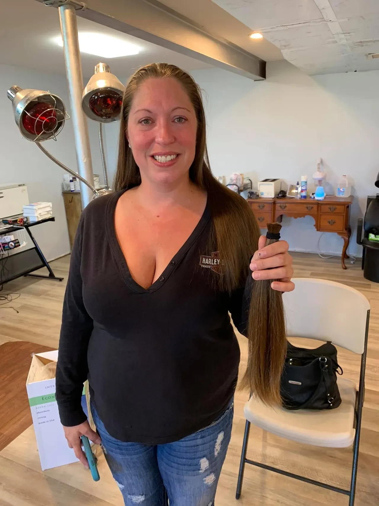 Salon client donating hair at Marisalon